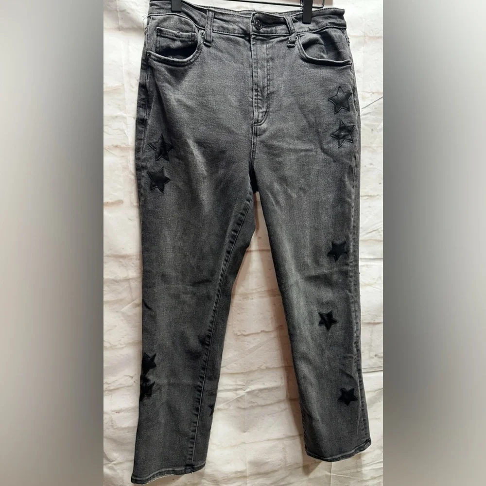 Juicy Couture women’s black‎ jeans with leathers stars size 28